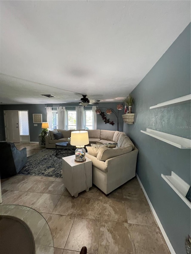 living room featuring ceiling fan