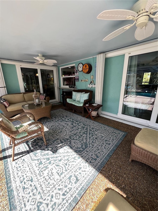 living room with ceiling fan