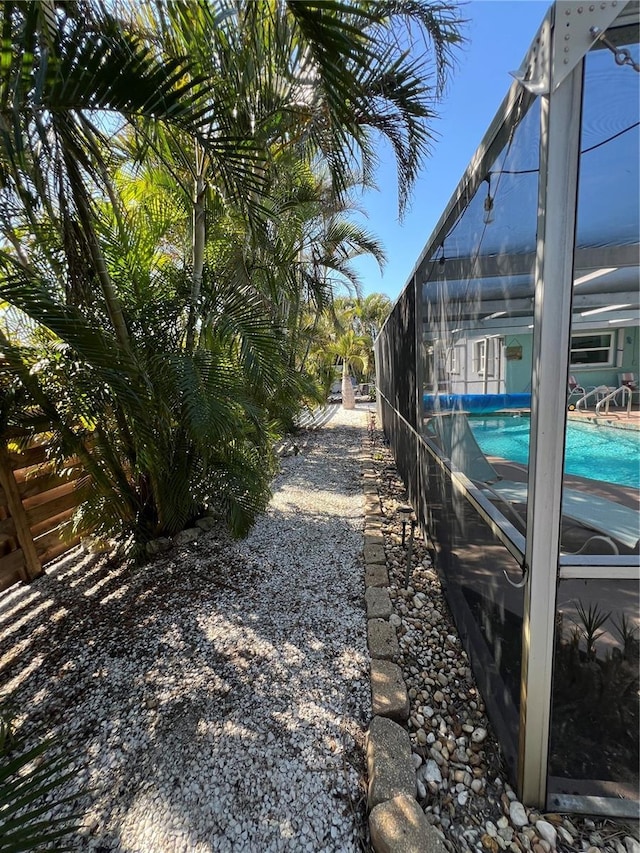 view of yard featuring a lanai