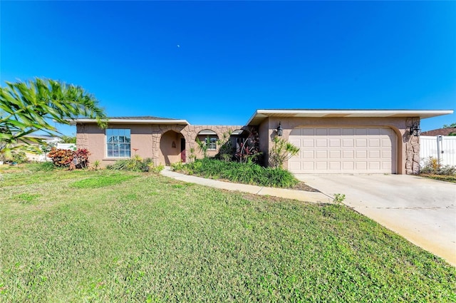 ranch-style home with a garage and a front yard