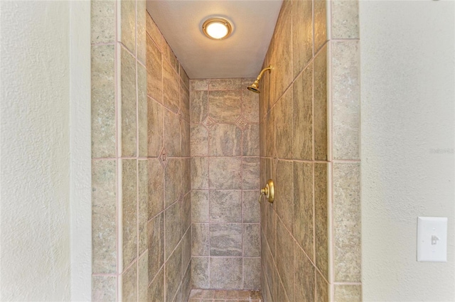 interior space with a tile shower