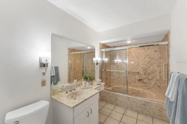 full bathroom with vanity, tile patterned flooring, enclosed tub / shower combo, and toilet