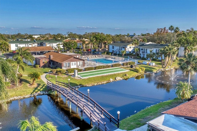 bird's eye view with a water view