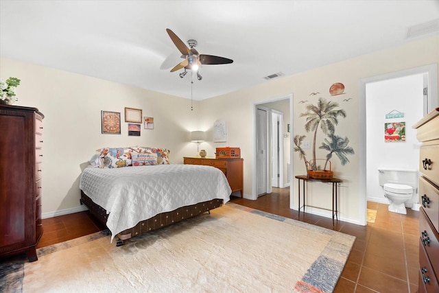 tiled bedroom with ceiling fan