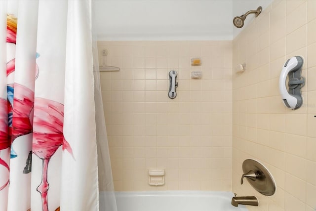 bathroom with shower / tub combo