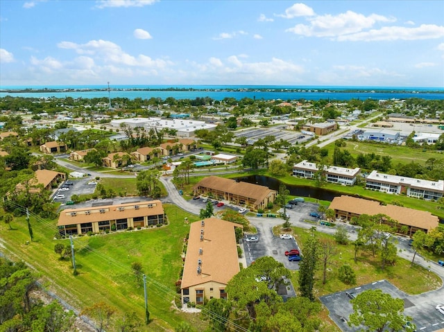 bird's eye view with a water view