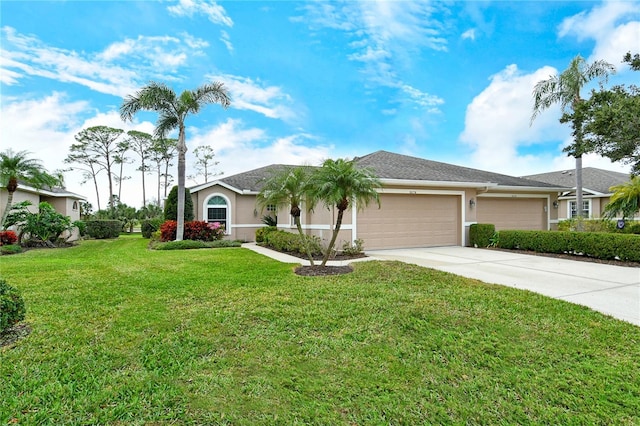 ranch-style house featuring a garage and a front yard