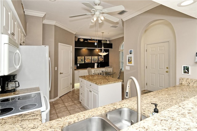 kitchen featuring sink, white appliances, crown molding, ceiling fan, and white cabinetry