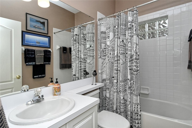 full bathroom featuring vanity, shower / tub combo with curtain, and toilet