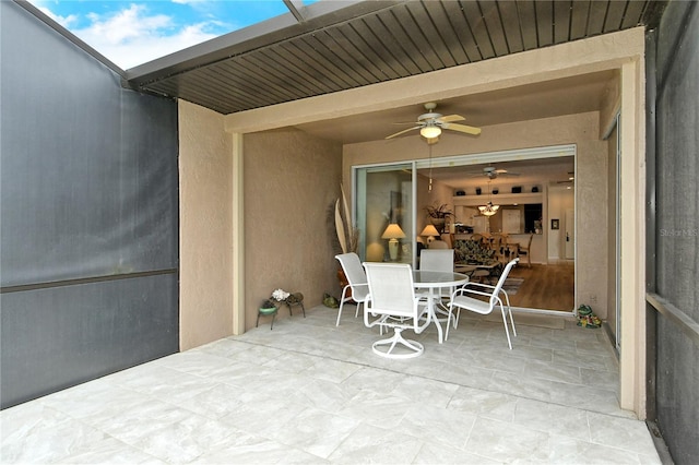 view of patio / terrace featuring ceiling fan