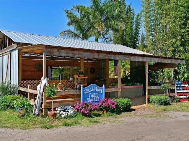 view of property's community with an outdoor structure