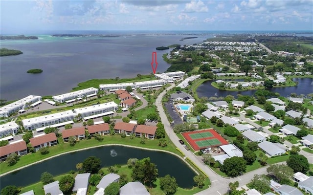 bird's eye view featuring a water view and a residential view