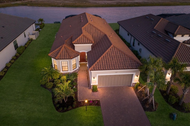 aerial view featuring a water view