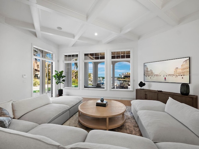 living room with beamed ceiling, coffered ceiling, and hardwood / wood-style floors