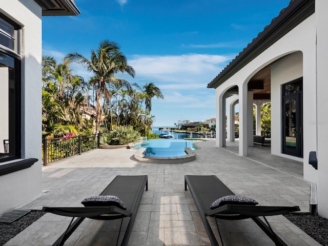 view of swimming pool featuring a patio