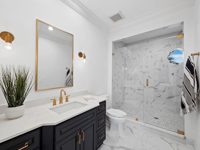 bathroom featuring ornamental molding, toilet, vanity, and a shower with shower door