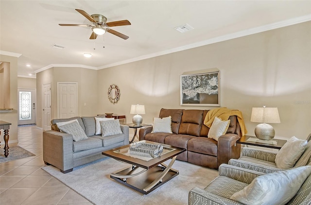 tiled living room featuring ceiling fan and ornamental molding