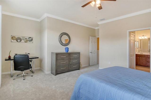 carpeted bedroom featuring crown molding, ensuite bath, and ceiling fan