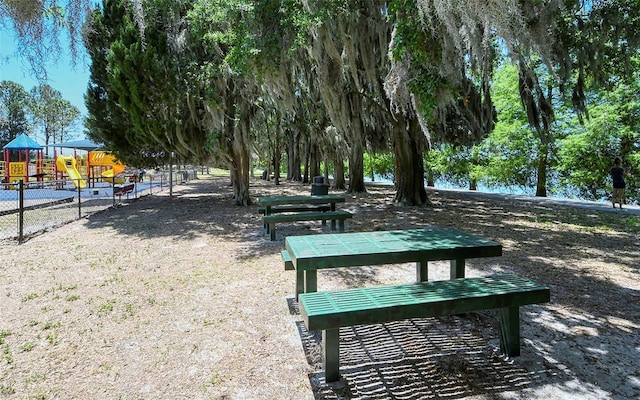 view of property's community with a playground