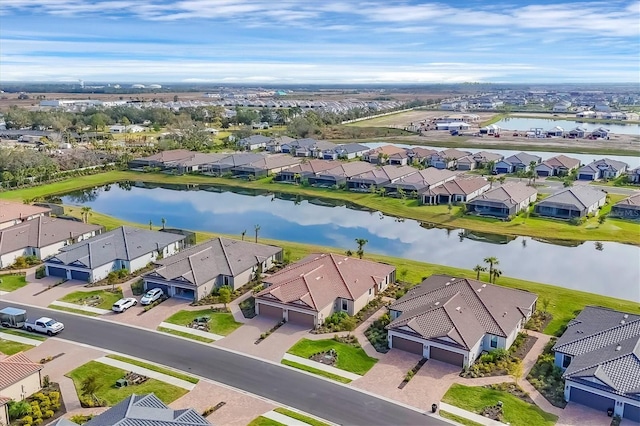 drone / aerial view featuring a water view