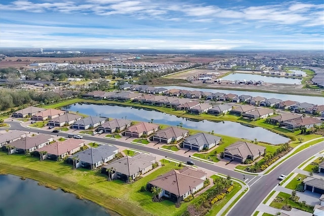 drone / aerial view with a water view