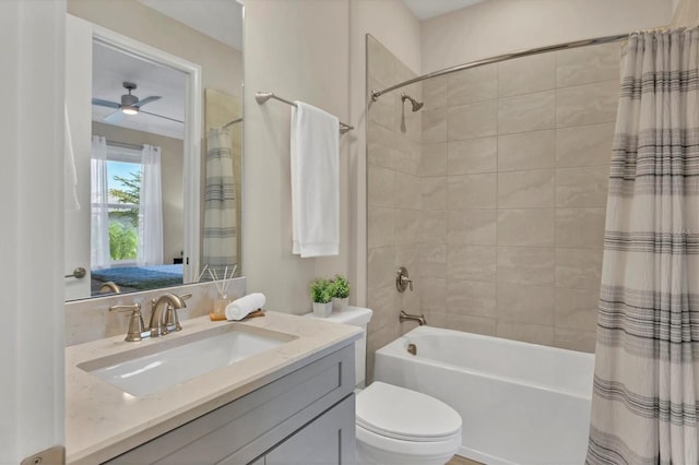 full bathroom with vanity, shower / bath combination with curtain, and toilet