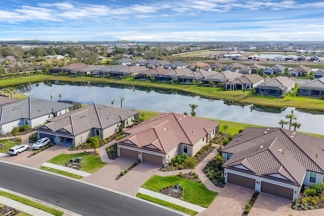 bird's eye view with a water view