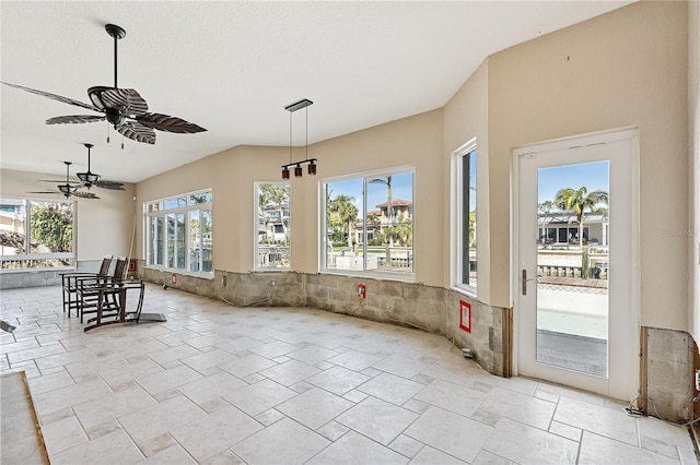 interior space featuring ceiling fan