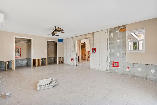 unfurnished room featuring ceiling fan