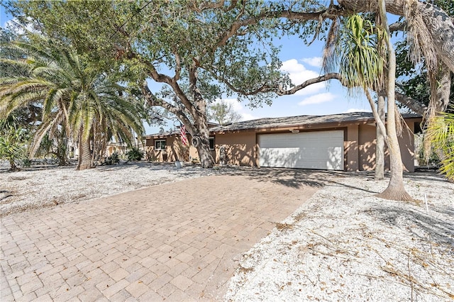 view of front of home with a garage