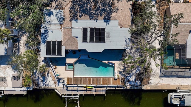 bird's eye view with a water view