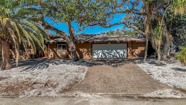 view of front of home with a garage