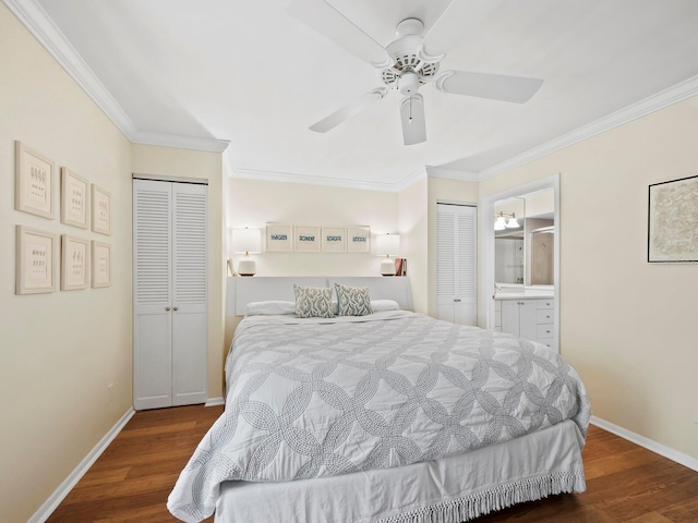 bedroom featuring multiple closets, ornamental molding, dark hardwood / wood-style floors, and ensuite bathroom