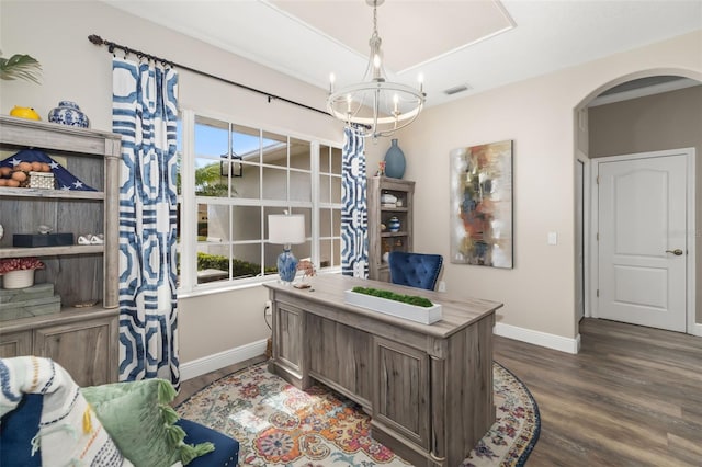 home office with plenty of natural light, visible vents, arched walkways, and dark wood-type flooring