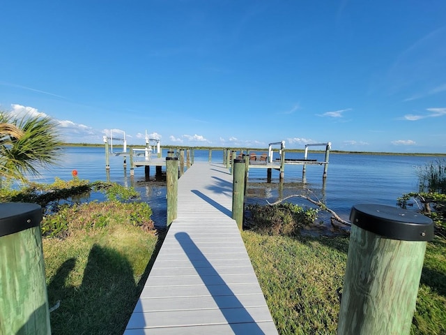 view of dock with a water view