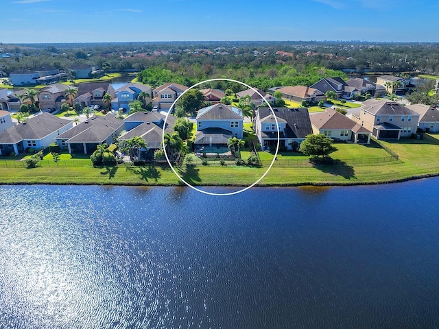 aerial view featuring a water view and a residential view