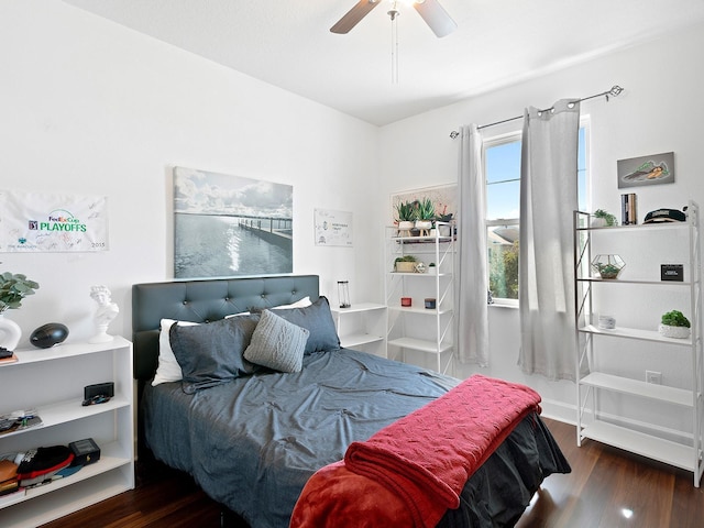 bedroom featuring ceiling fan and wood finished floors