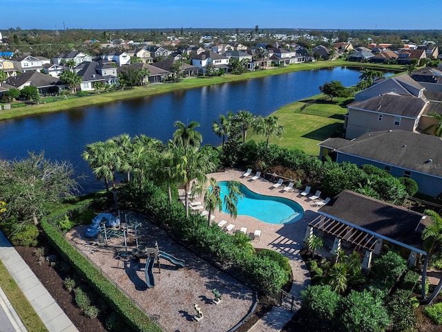 aerial view featuring a residential view and a water view