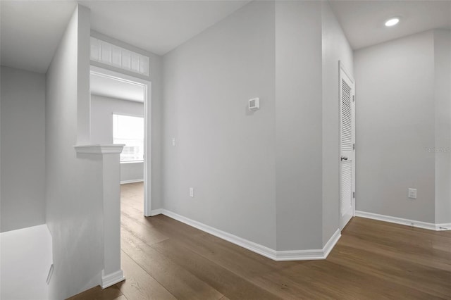 corridor featuring hardwood / wood-style flooring