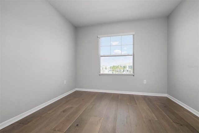 spare room featuring hardwood / wood-style flooring