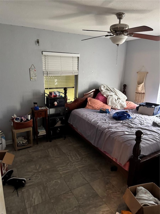 bedroom featuring ceiling fan