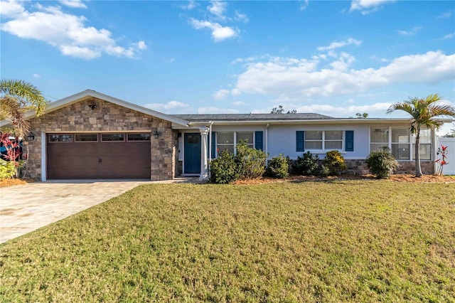 single story home featuring a garage and a front yard