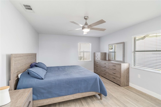 bedroom featuring ceiling fan and light hardwood / wood-style flooring