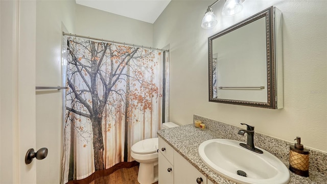 5116 Timber Chase Way, Sarasota, FL 34238 - bathroom featuring vanity, wood finished floors, and curtained shower