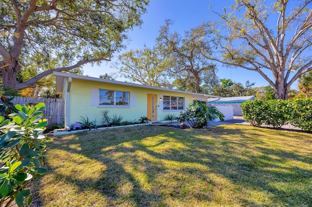 ranch-style house with a front yard