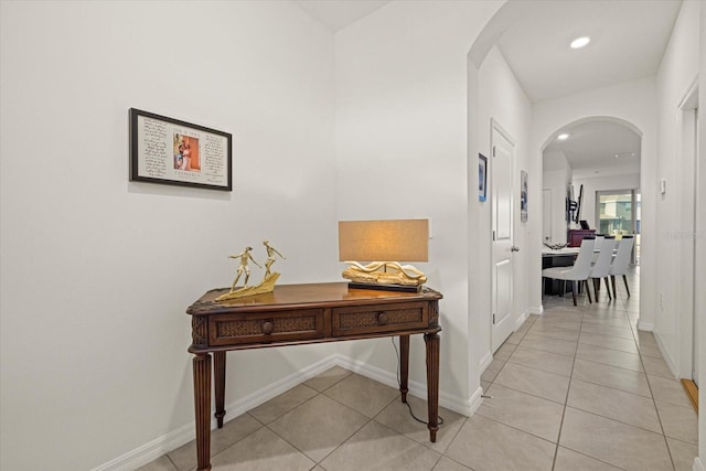 hallway with light tile patterned floors