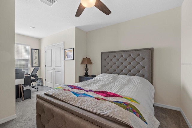 carpeted bedroom featuring ceiling fan