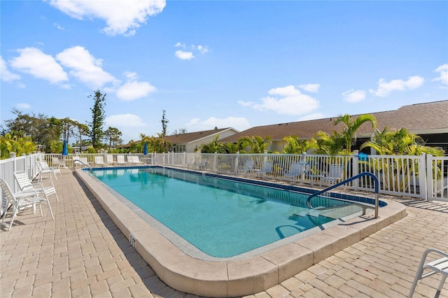 view of swimming pool featuring a patio