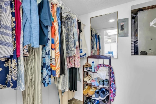 walk in closet with tile patterned flooring