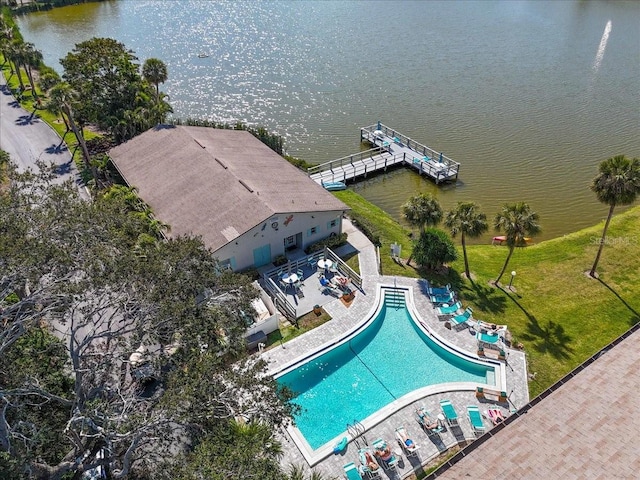 birds eye view of property featuring a water view